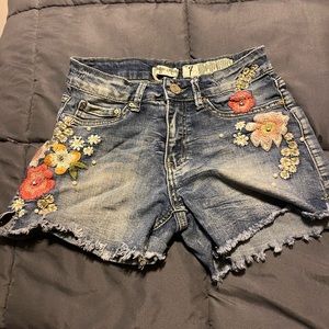 Denim jeans with flower design